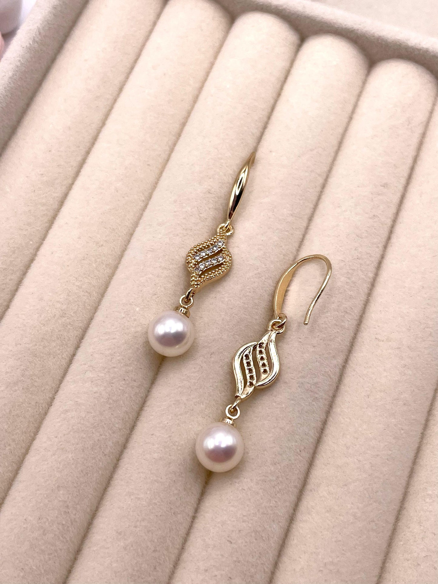 Wunderschöne, zarte Ohrringe mit Süßwasserperlen