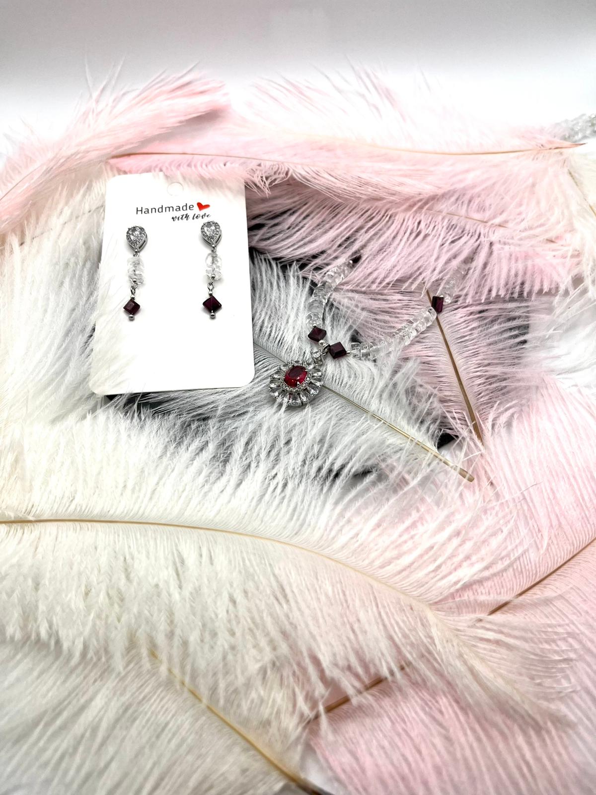 Schmuckset aus Bergkristall & Granat mit funkelndem Anhänger