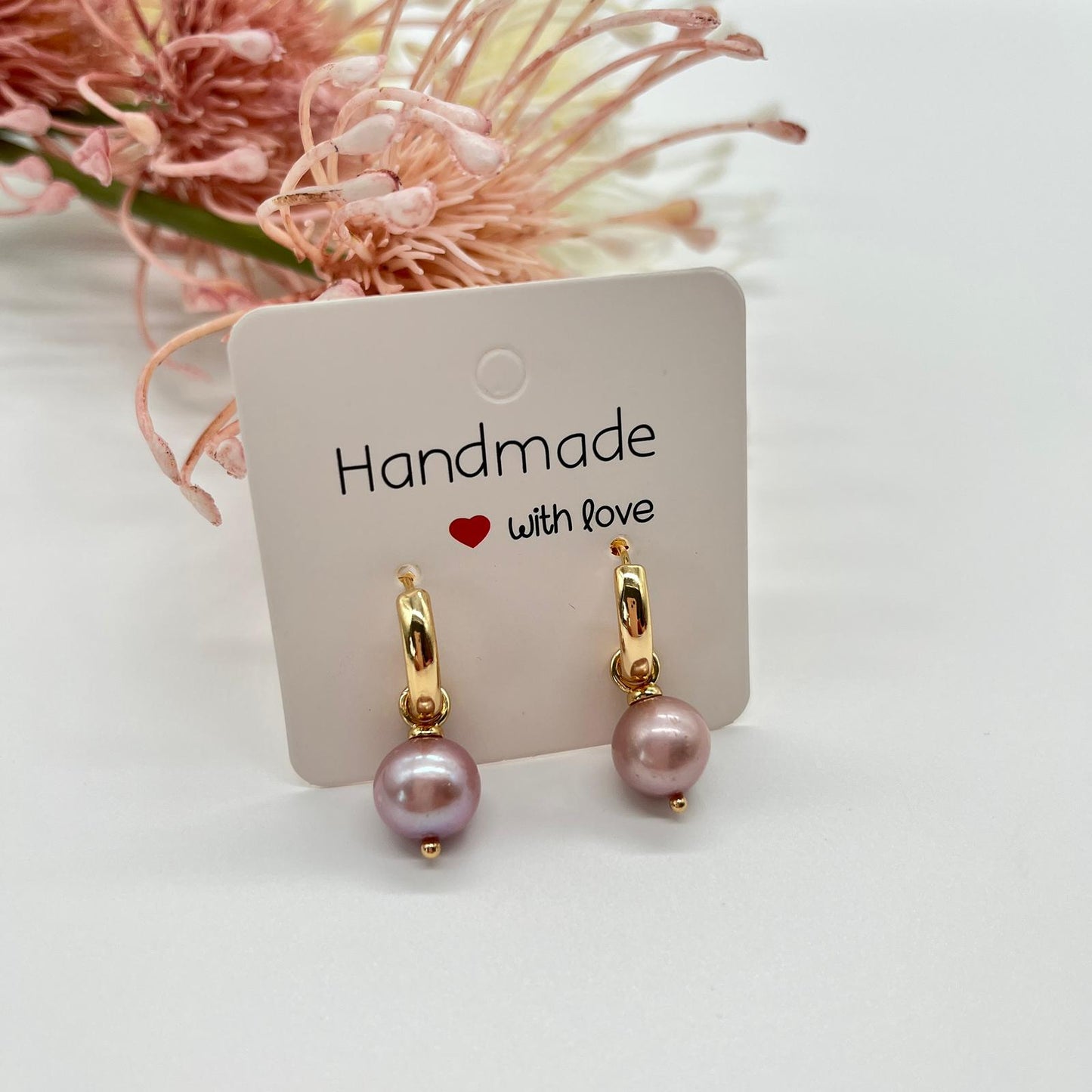 Creolen in gold mit echten Perlen in rosé