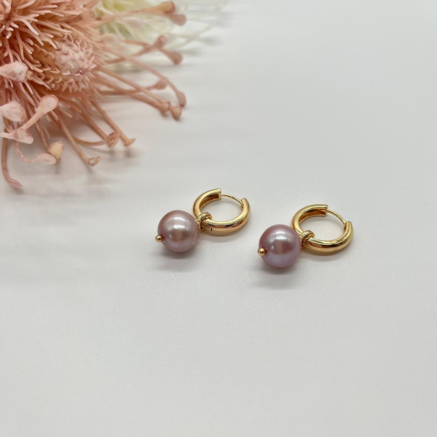 Creolen in gold mit echten Perlen in rosé