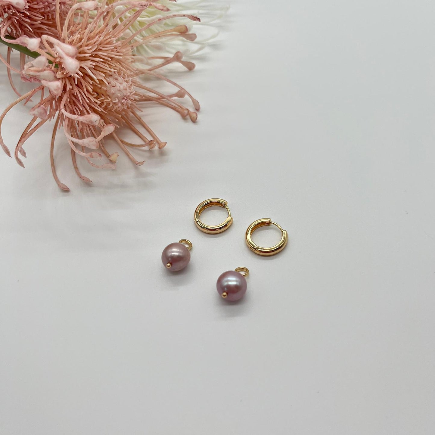 Creolen in gold mit echten Perlen in rosé