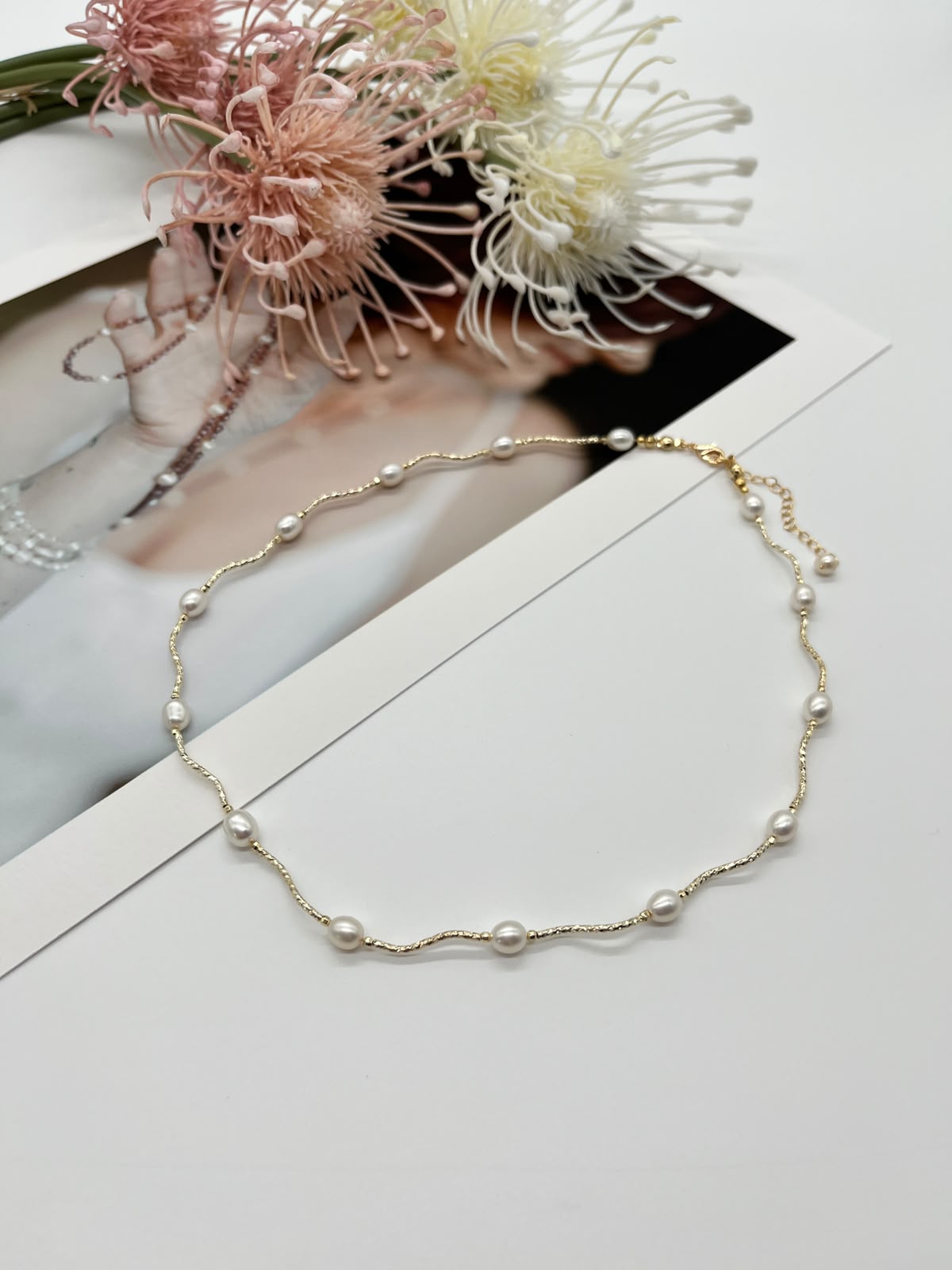 Collier „Perlenwelle“ in Gold mit echten Süßwasserperlen