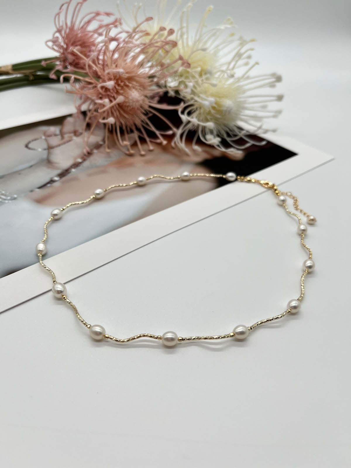 Collier „Perlenwelle“ in Gold mit echten Süßwasserperlen