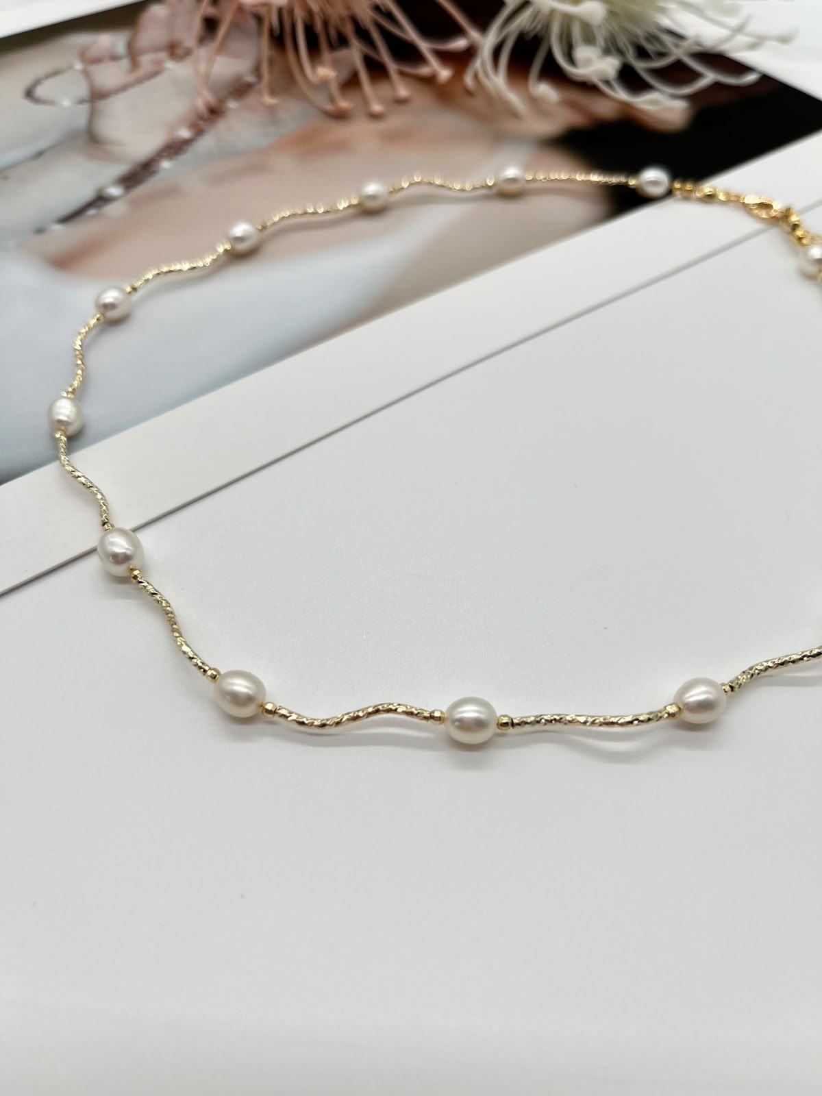Collier „Perlenwelle“ in Gold mit echten Süßwasserperlen