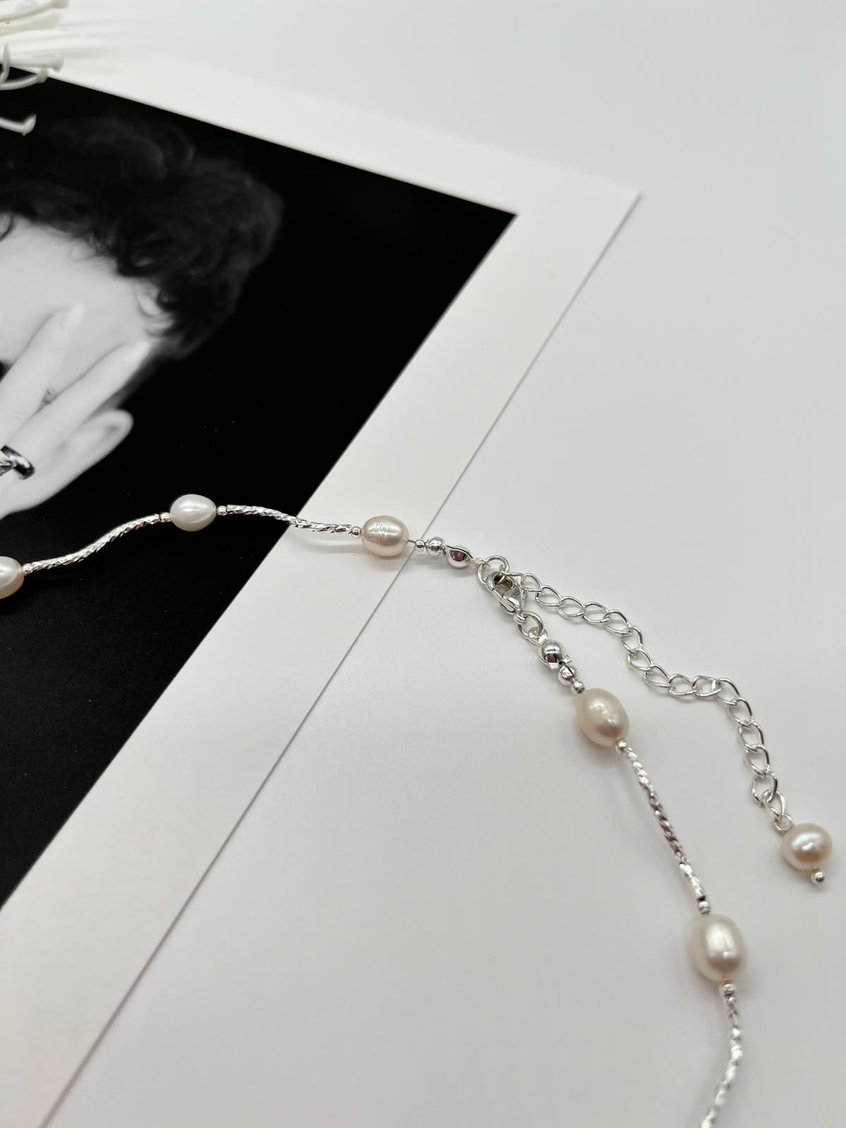 Collier „Perlenwelle“ in Silber mit echten Süßwasserperlen